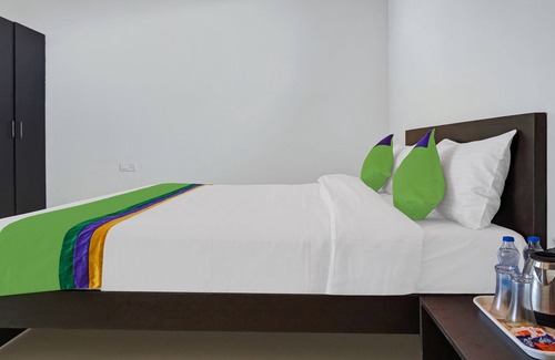 Medha Hotel | Treebo Blooms & Berries Agro Tourism