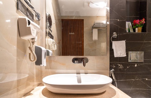 Thane West Hotel | Treebo Premium Heritage Grand, Thane