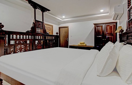 Cherthala Hotel | Treebo Premium Travancore Palace Cherthala
