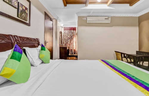 Irinjalakuda Hotel | Treebo Symphony Hotels And Resorts Angamally