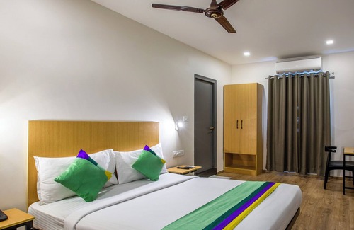 Ulsoor Hotel | Treebo Tierra Woods Indiranagar