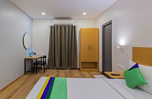 Ulsoor Hotel | Treebo Tierra Woods Indiranagar