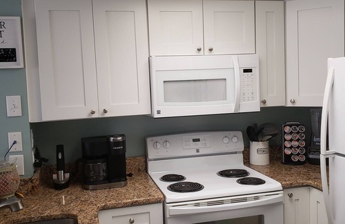 North Ocean City Condo | Trendy Oceanfront Unit! Wake-up to the waves.