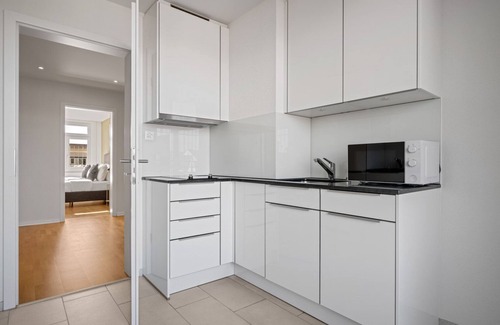 Sihlfeld Apartment | Trendy Wiedikon 4.5 Room w/Storage & W/D, 1 min to Market, by Blueground