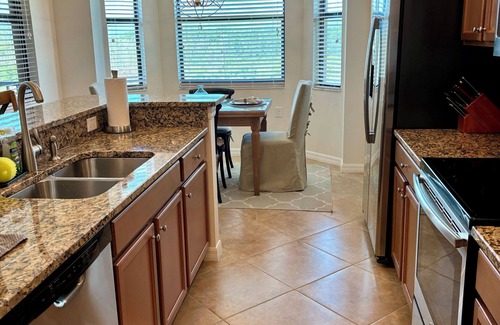 Naples Condo | Treviso Bay Top floor water view condo - Golf & Social Memberships Available