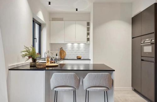 Knokke Apartment | Triton luxe gelijkvloers appartement met tuin en gratis garage