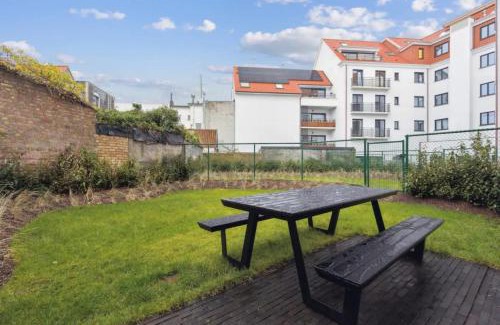 Knokke Apartment | Triton luxe gelijkvloers appartement met tuin en gratis garage
