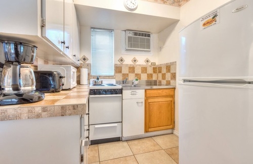 Capri Isle Apartment | Tropic Terrace Suite #16 - Beachfront Resort