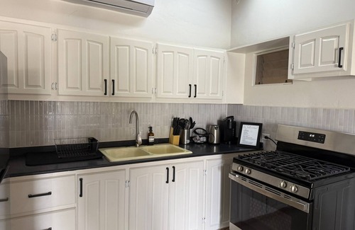 Fitches Creek House | Tropical Bliss Retreat – 3BR Oasis near Beach, St. John’s & Airport