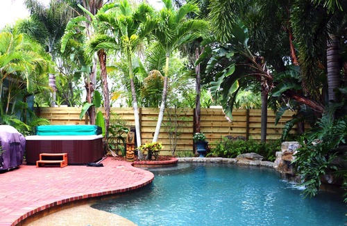 Bradenton House | Tropical bungalow oasis; heated pool with rock waterfall and hot tub. Sleeps 8!
