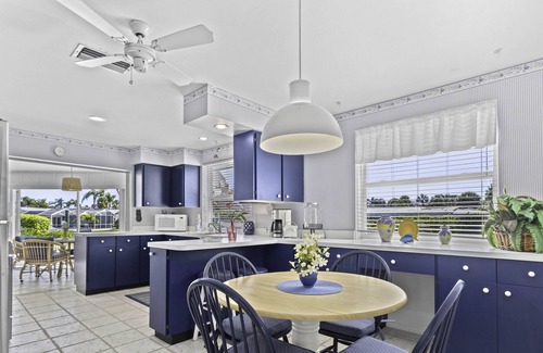Sarasota House | Tropical Canal Home–Pool, Sun & Water Access: Paradise Cottage in LBK by RVA