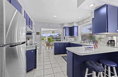 Sarasota House | Tropical Canal Home–Pool, Sun & Water Access: Paradise Cottage in LBK by RVA