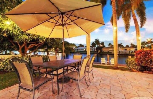 Cypress Lakes Villa | Tropical Dream: Waterfront pool home w/boat rental