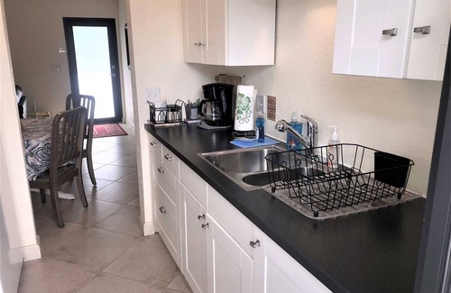 East Fort Lauderdale House | Tropical Garden Apartment is just Steps to Sand, Surf and Fun!
