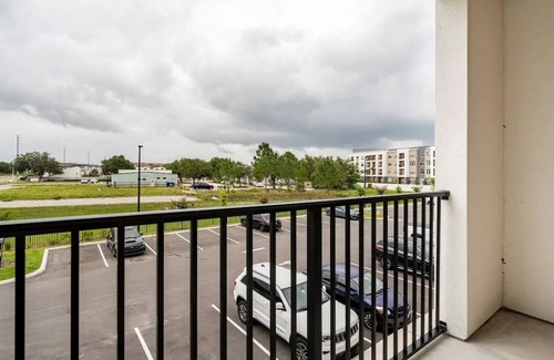 Loughman Apartment | Tropical Luxe near DISNEY - POOL, GYM, ENTERTAINMENT ROOM - Great for Relaxing
