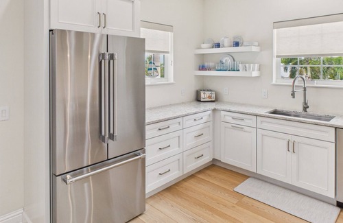 Holmes Beach House | Tropical Oasis| Pool, Hot Tub, Game Room & 7 Minute Walk to the Beach!