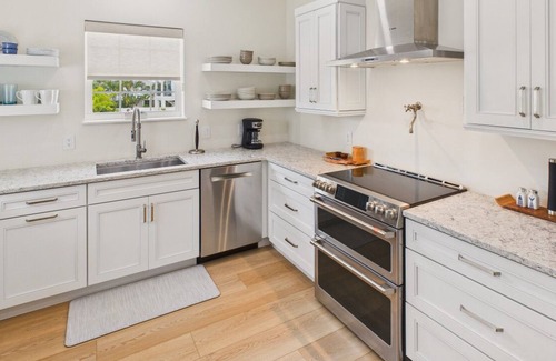 Holmes Beach House | Tropical Oasis| Pool, Hot Tub, Game Room & 7 Minute Walk to the Beach!