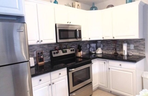 Dolphin Isles Apartment | Tropical oasis 1 bed 3 min walk to beachnStay 1 week save 10% 1 month save 20%