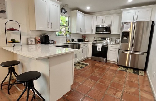 Indian River Estates House | Tropical Oasis With HEATED Pool, Just minutes from the Downtown and the Beaches.