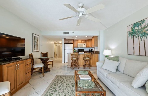 Daytona Beach Shores Apartment | Tropical Palms Partial Ocean View Pool Hot Tub