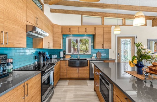 Cocoa Beach House | 🌴 Tropical Riverfront Retreat w/Heated Pool, Spa, Tiki Hut & Dock!