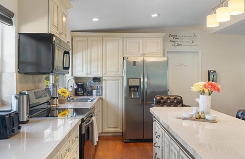 Sunset House | Tropical salt water pool home close to beaches,Hard Rock,Airport and Downtown!