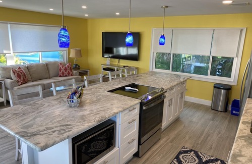 Englewood House | Tropical Treehouse is Less than a 2 Minute walk to the beach.Walk or bike to r
