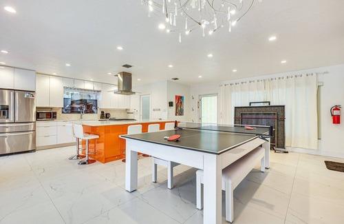 Nautilus Isle House | Tropical water front 2-bedroom 3 king beds house with heated pool & Sauna
