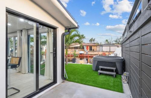 Melaleuca Gardens House | Tropical WaterFront Oasis