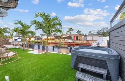 Melaleuca Gardens House | Tropical WaterFront Oasis