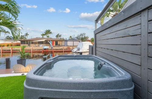 Melaleuca Gardens House | Tropical WaterFront Oasis