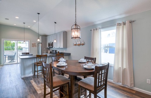 Butler Beach House | Tropical Winds - Heated Pool & Firepit! Walk to the Beach!