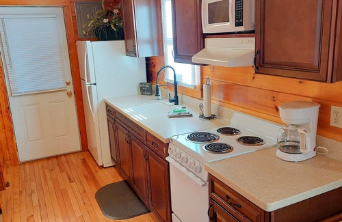 Bryson City Cabin | Troutin' About - A cozy cabin on the river!