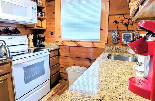 Gatlinburg - Pigeon Forge Cabin | True Log Cabin w/Beautiful Views! LED Hot Tub, WiFi, Picnic Pavilion, Grill Area
