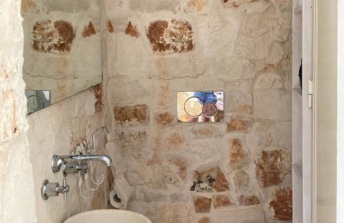 San Michele Salentino Villa | Trullo Sorores (12 pax): House with swimming pool. Puglia (Southern Italy)