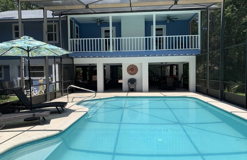 Englewood House | Tucked Away on Wooded Way located blocks from Manasota Beach with Heated Pool.