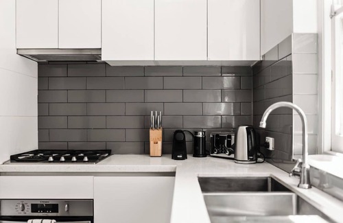 Toorak House | Tudor Tranquility Garden Retreat by Toorak Village