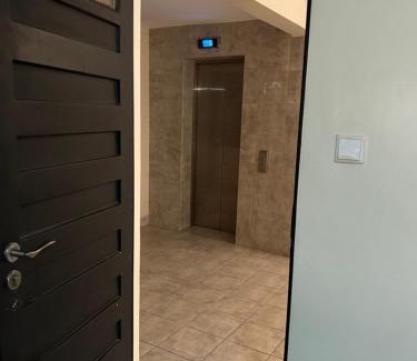 Kasarani Apartment | Tulia 1 BR apartment in Kasarani Nairobi with washing machine, lift , wifi, office desk and parking