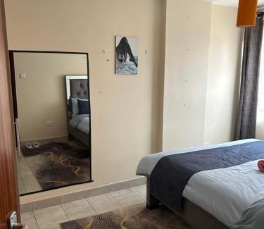 Kasarani Apartment | Tulia 1 BR apartment in Kasarani Nairobi with washing machine, lift , wifi, office desk and parking