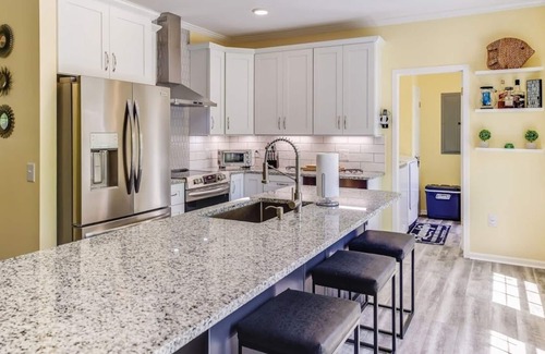 Bracey House | Turnkey Lakefront Vacation Home with Main Lake Access & Cove Tranquility