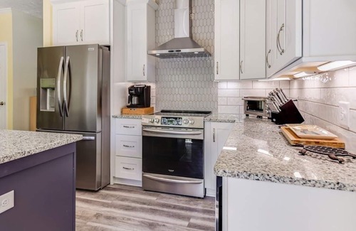 Bracey House | Turnkey Lakefront Vacation Home with Main Lake Access & Cove Tranquility