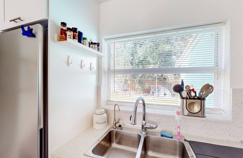 Edgewood House | Turquoise charmer with enclosed yard, open layout, & W/D - snowbird-friendly
