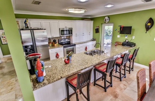 Marathon House | Turtle Time - Beautiful waterfront home with pool, dock and tropical landscaping