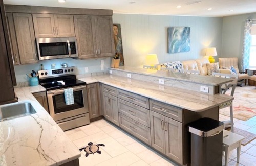Toilla Segunda House | Turtles Nest, updated Family beach cottage only 1 block from the Gulf of Mexico.