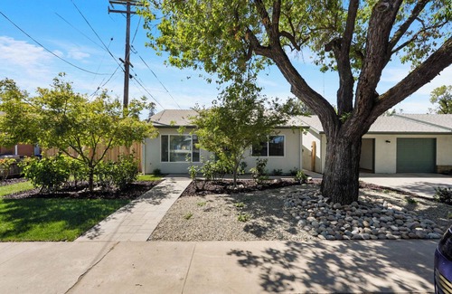 Modesto House | TVs in living and master, private yard and high-speed Wi-Fi.