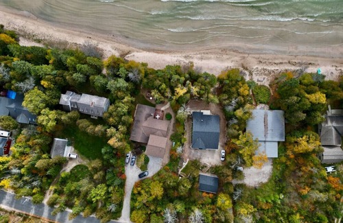 Rowleys Bay House | Twin Peaks- Private Beach at Sand Bay
