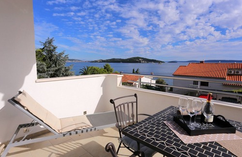 Seget Vranjica Apartment | Two bedroom apartment with terrace and sea view Seget Vranjica, Trogir (A-10328-a)