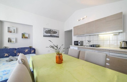 Raslina Apartment | Two bedroom apartment with balcony and sea view Raslina, Krka (A-24304-b)