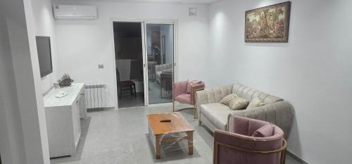 Monastir Apartment | two-bedroom apartment with a living room, kitchen and balcony