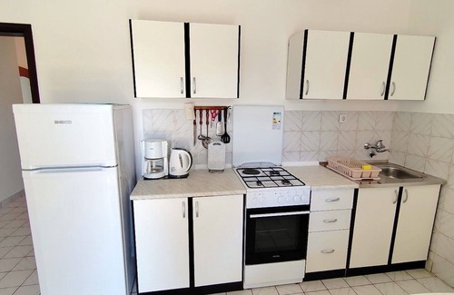 Barbat na Rabu Apartment | Two bedroom apartment with balcony Barbat, Rab (A-22752-b)